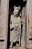 Bangkok Wat Arun - Details of the statues of Chinese saints of the pagoda at the corners of the Ubosot coutyard. 